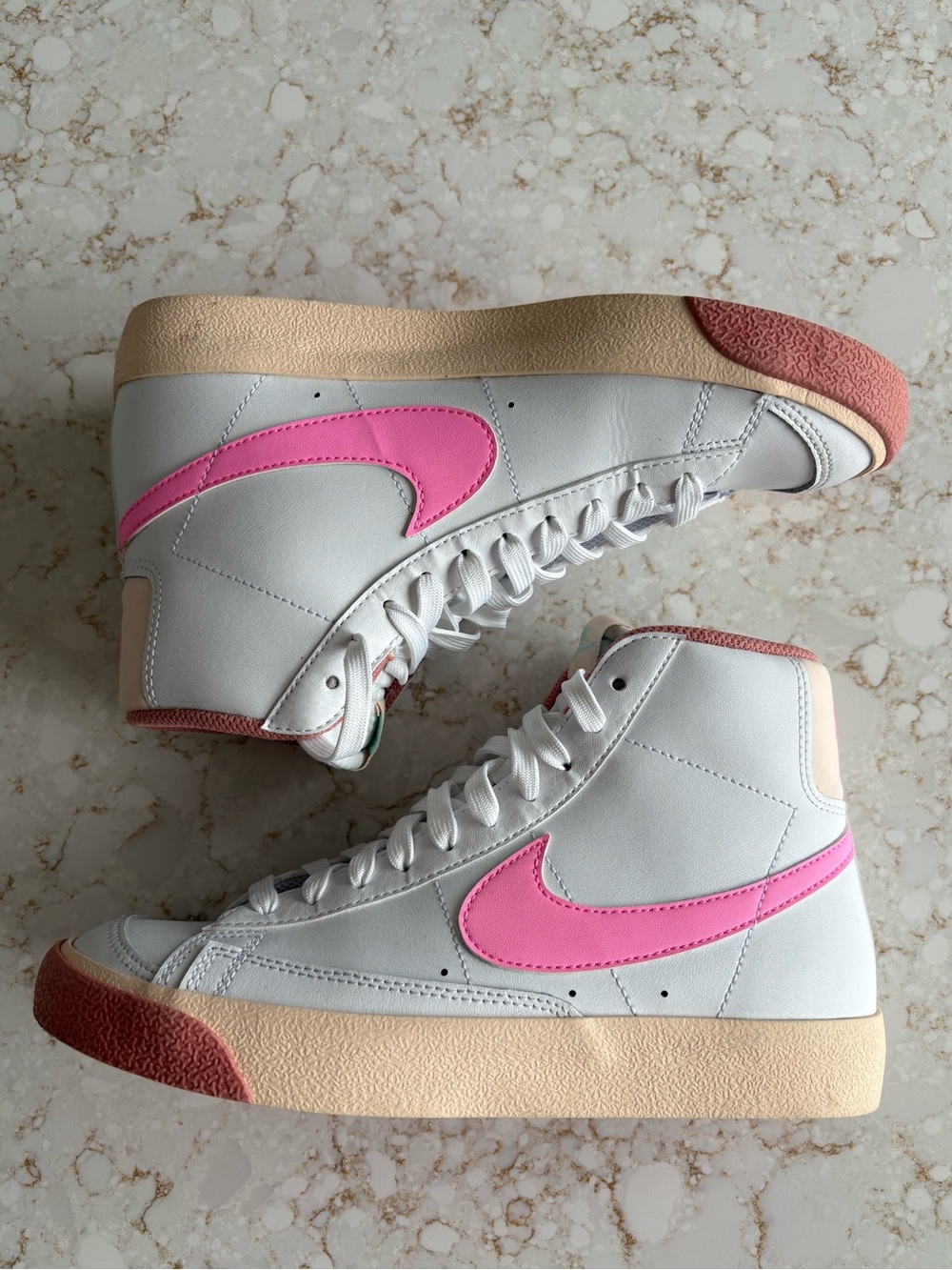 Nike White High-Top Sneakers with Pink Swoosh and Cream Sole